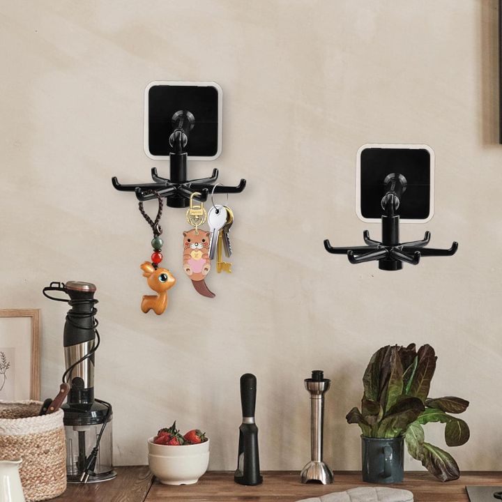 1+1 Gratis | 360° Drehbarer Klapphaken – Platzsparend & selbstklebend