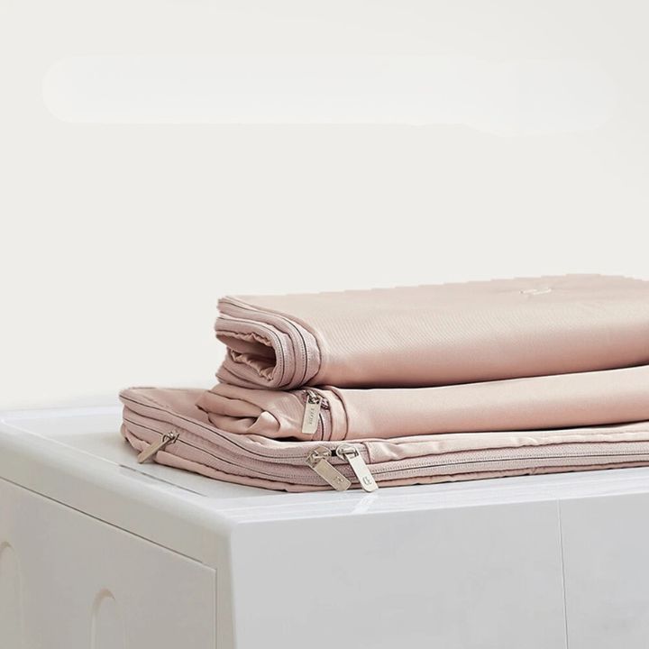 Platzsparende hängende Aufbewahrungstasche mit luftdichter Kompression