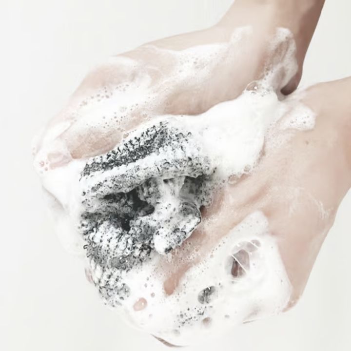 1+1 Gratis | Peeling-Duschtuch – Exfolierende Pflege für Gesicht & Körper